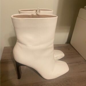 White Heeled Boots with Sleek Design